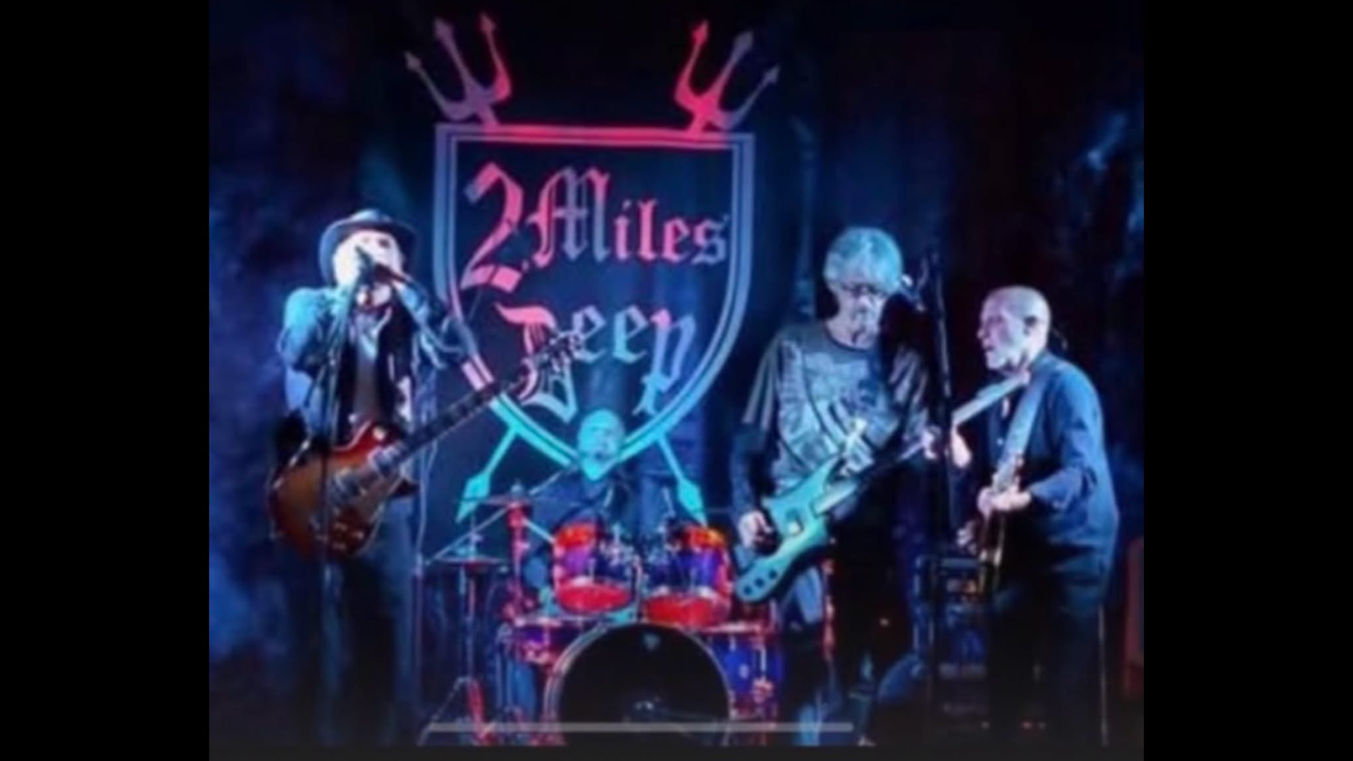 2 Miles Deep performing live on stage for a December 5 show at Magoon's Famous Delicatessen in St. Joseph.